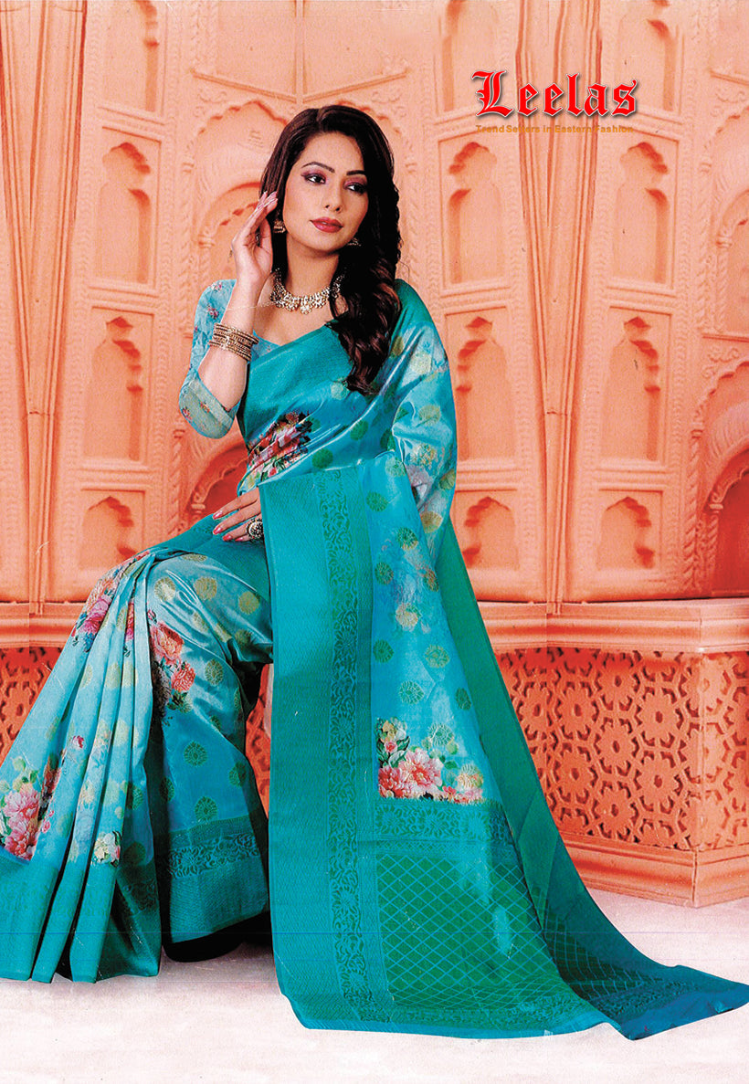 Turquoise floral organza saree