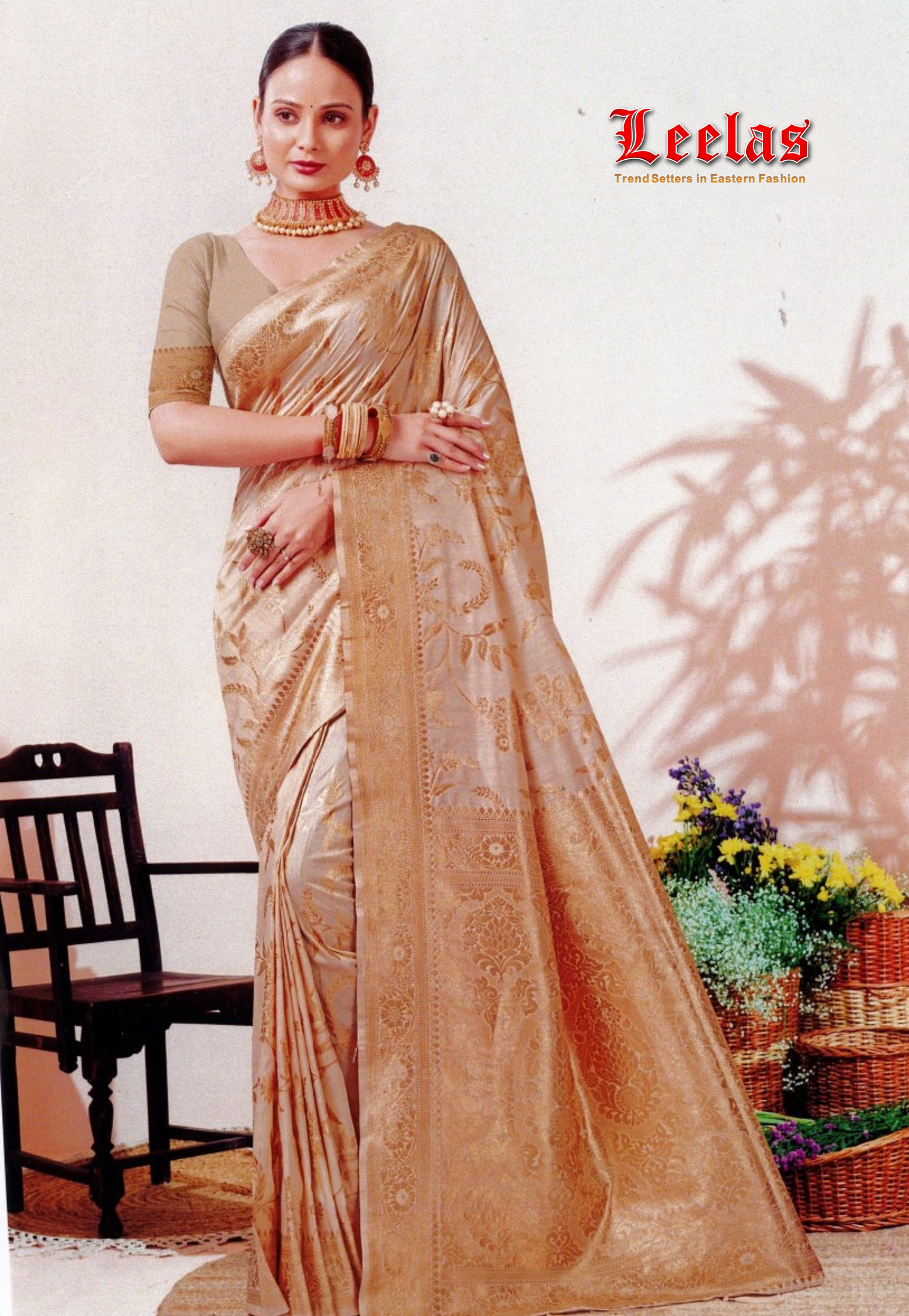 Cream and gold embossed silk saree with blouse piece