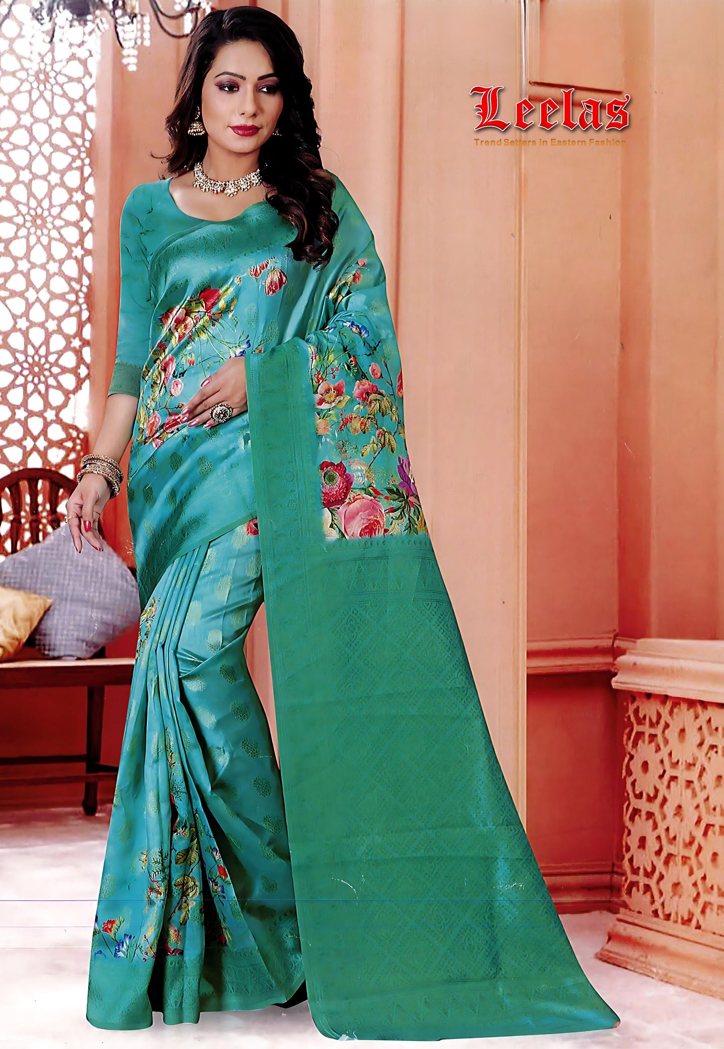 Turquoise organza saree