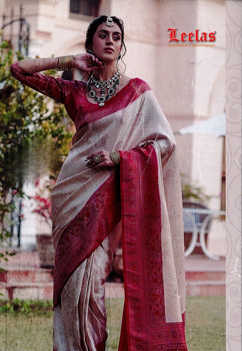 Cream art silk saree, cerise pink border with contrasting blouse piece