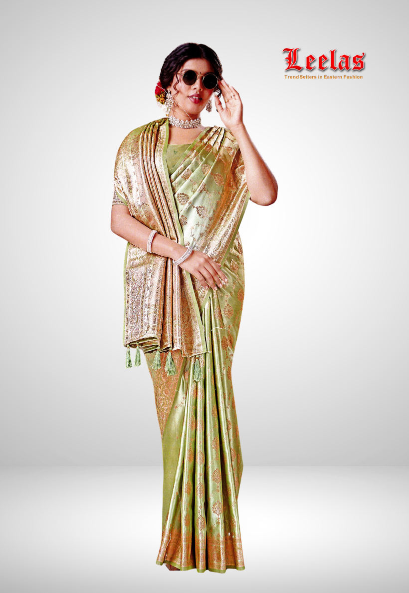 Mint green silk embossed saree with matching blouse piece