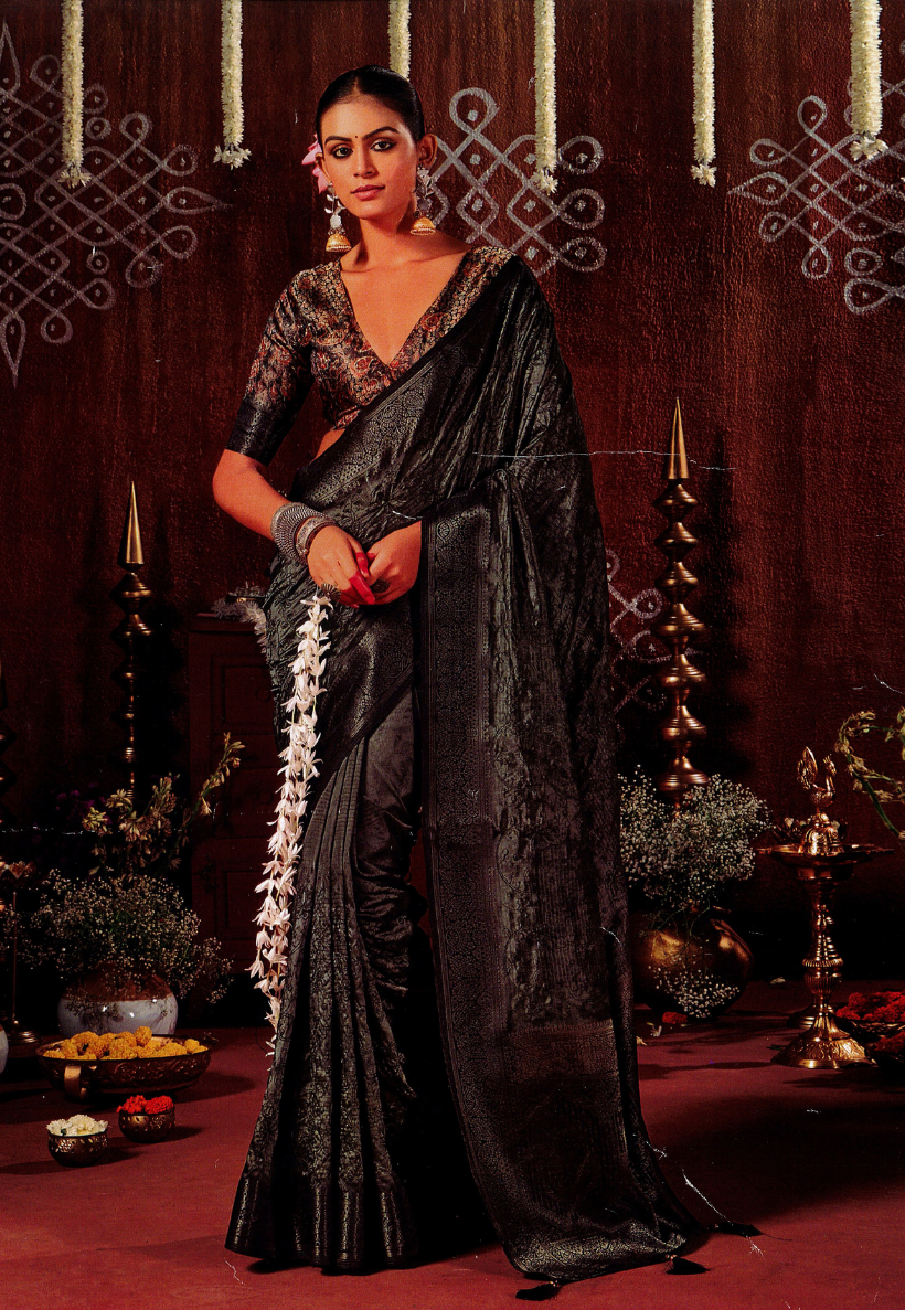Charcoal grey silk blend saree with light embroidery and paisley border
