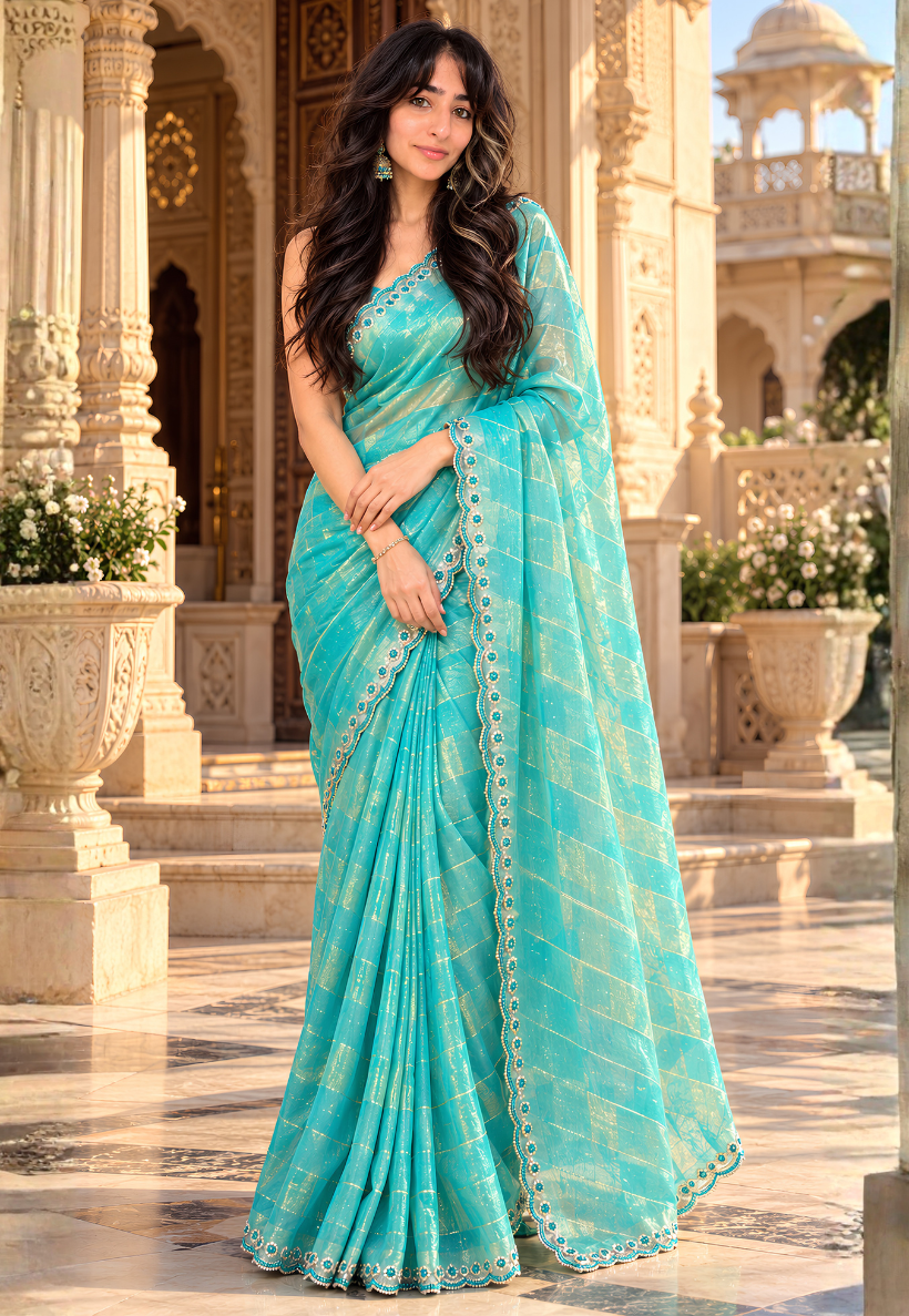 Silky turquoise shimmer saree with bead and stonework