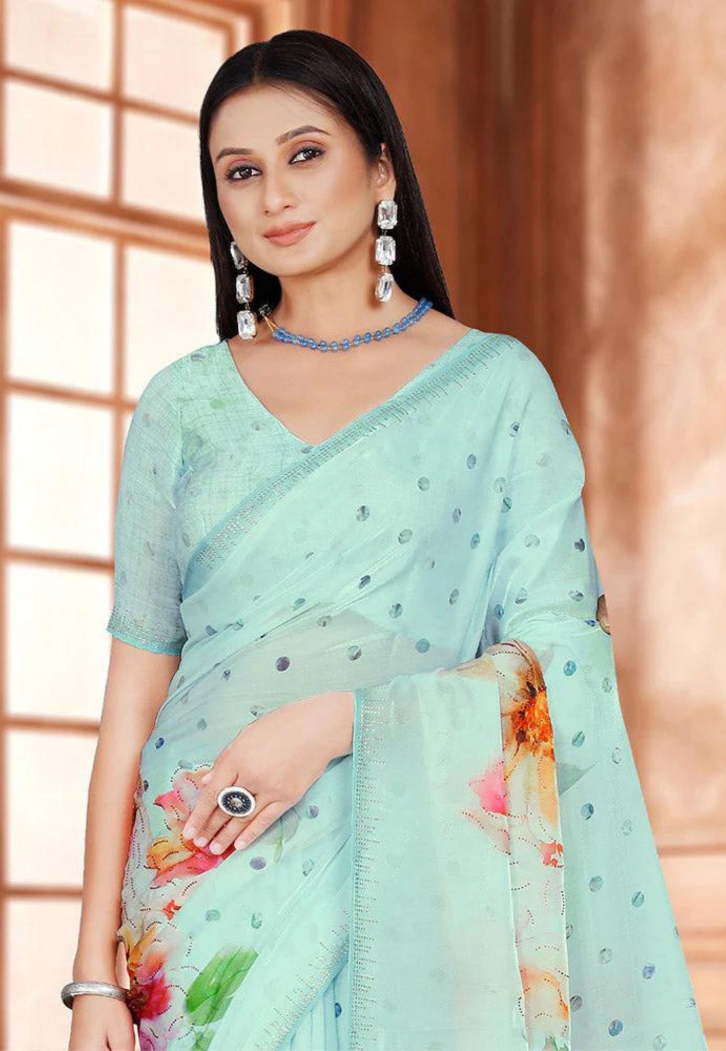 Sea green polka dot and floral saree
