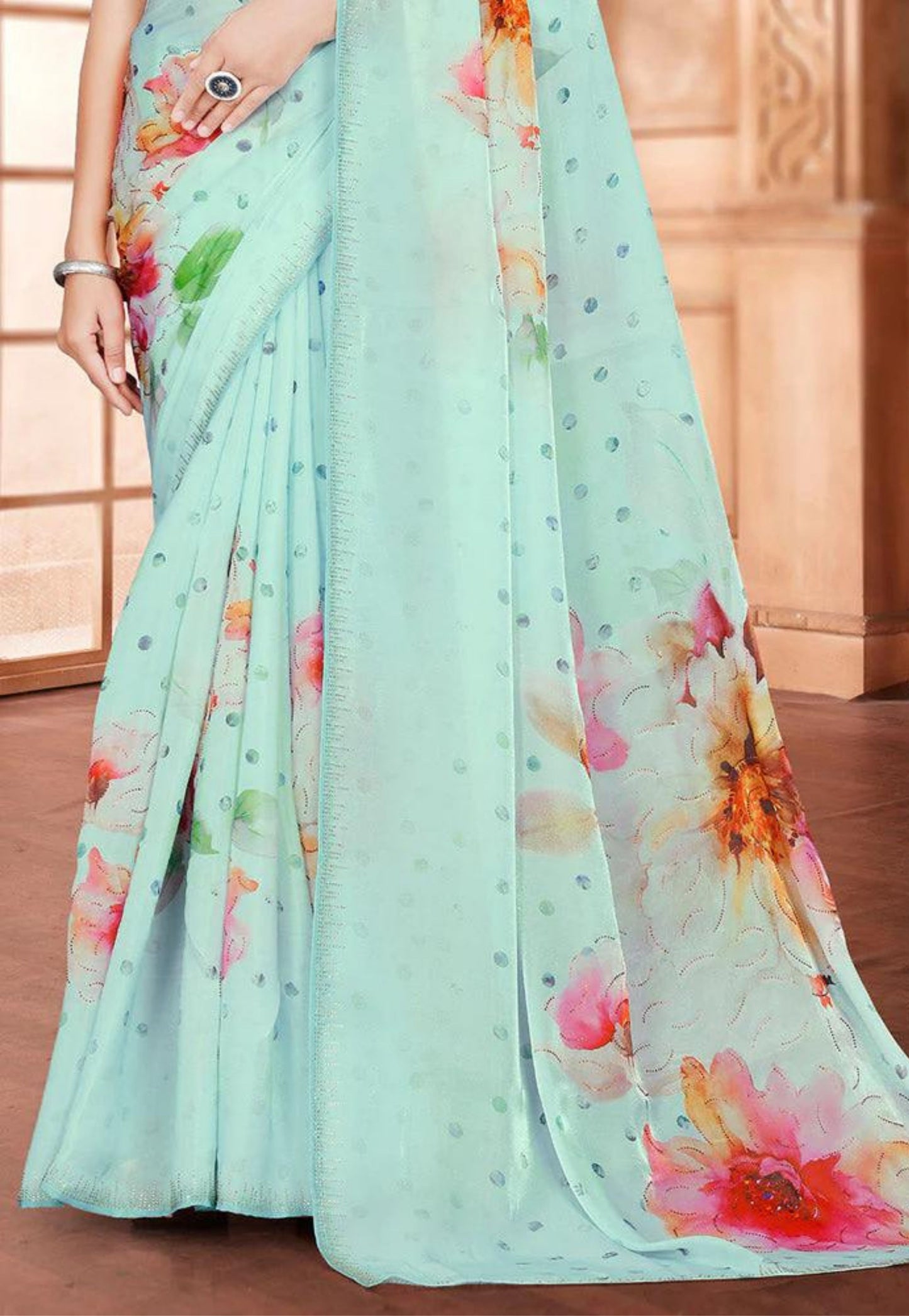 Sea green polka dot and floral saree