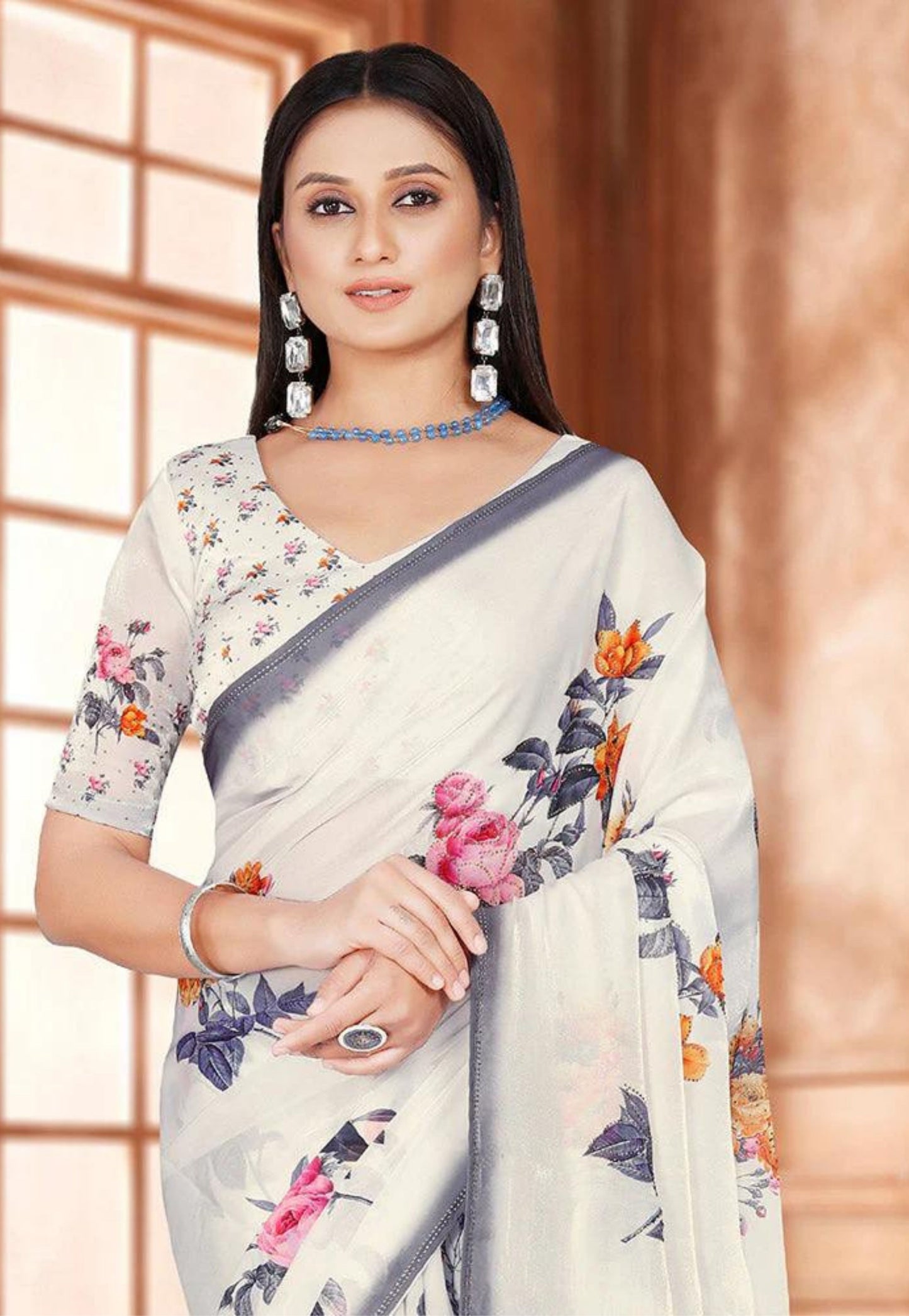 White, grey and floral printed chiffon saree with beadwork