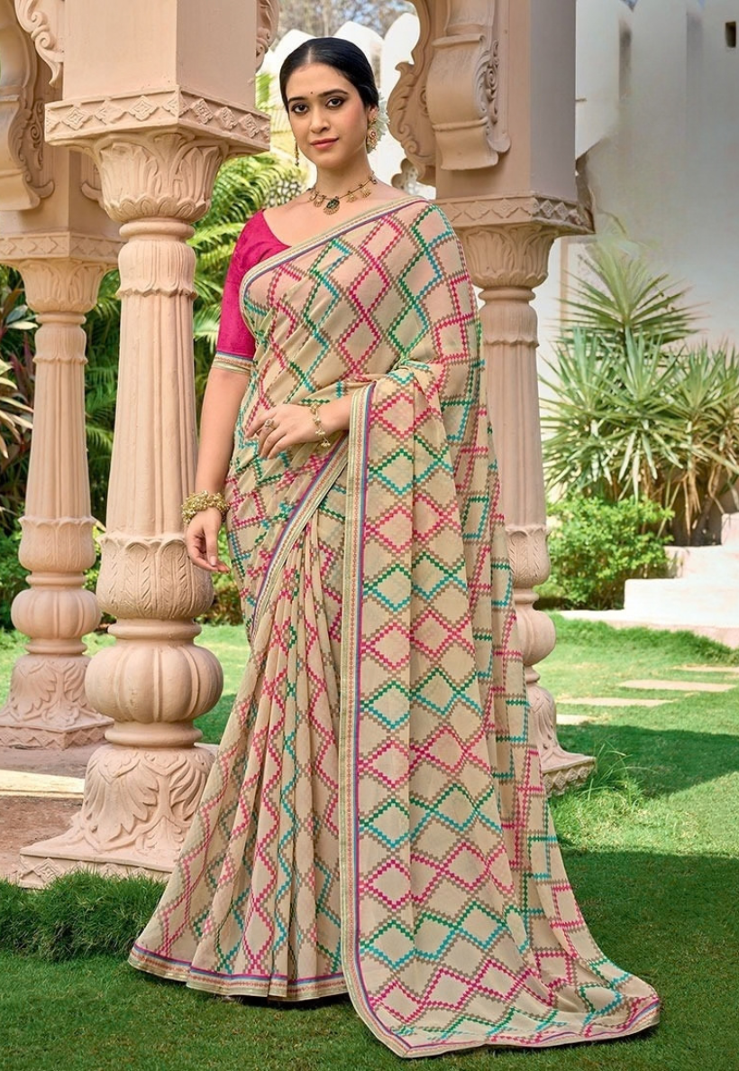 Lightweight georgette saree with matrix pattern in shades of magenta pink, teal green and muted taupe