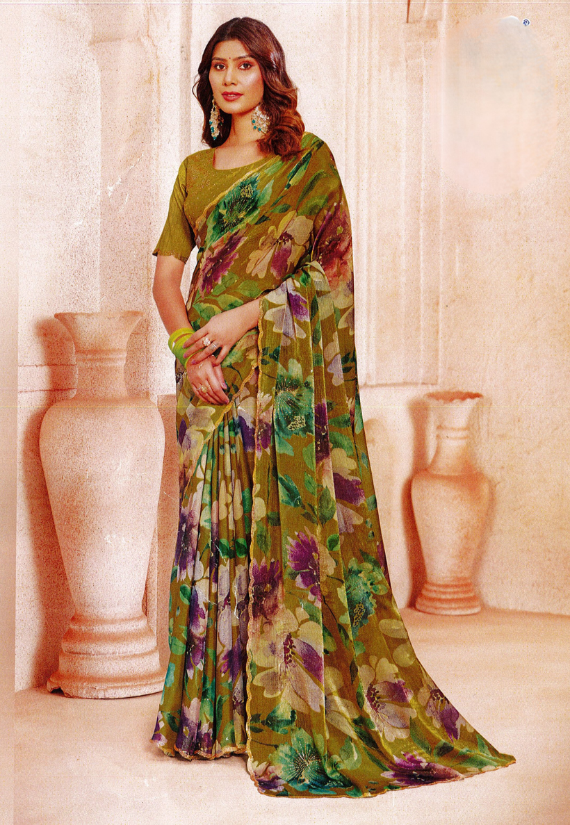 Vibrant watercolour floral saree in rich teal and seafoam green with stonework