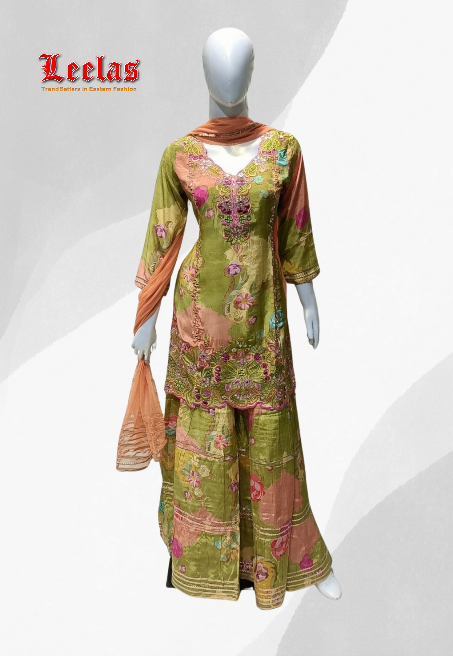 Olive green floral printed silk salwar kameez with pink embroidery and mirror work