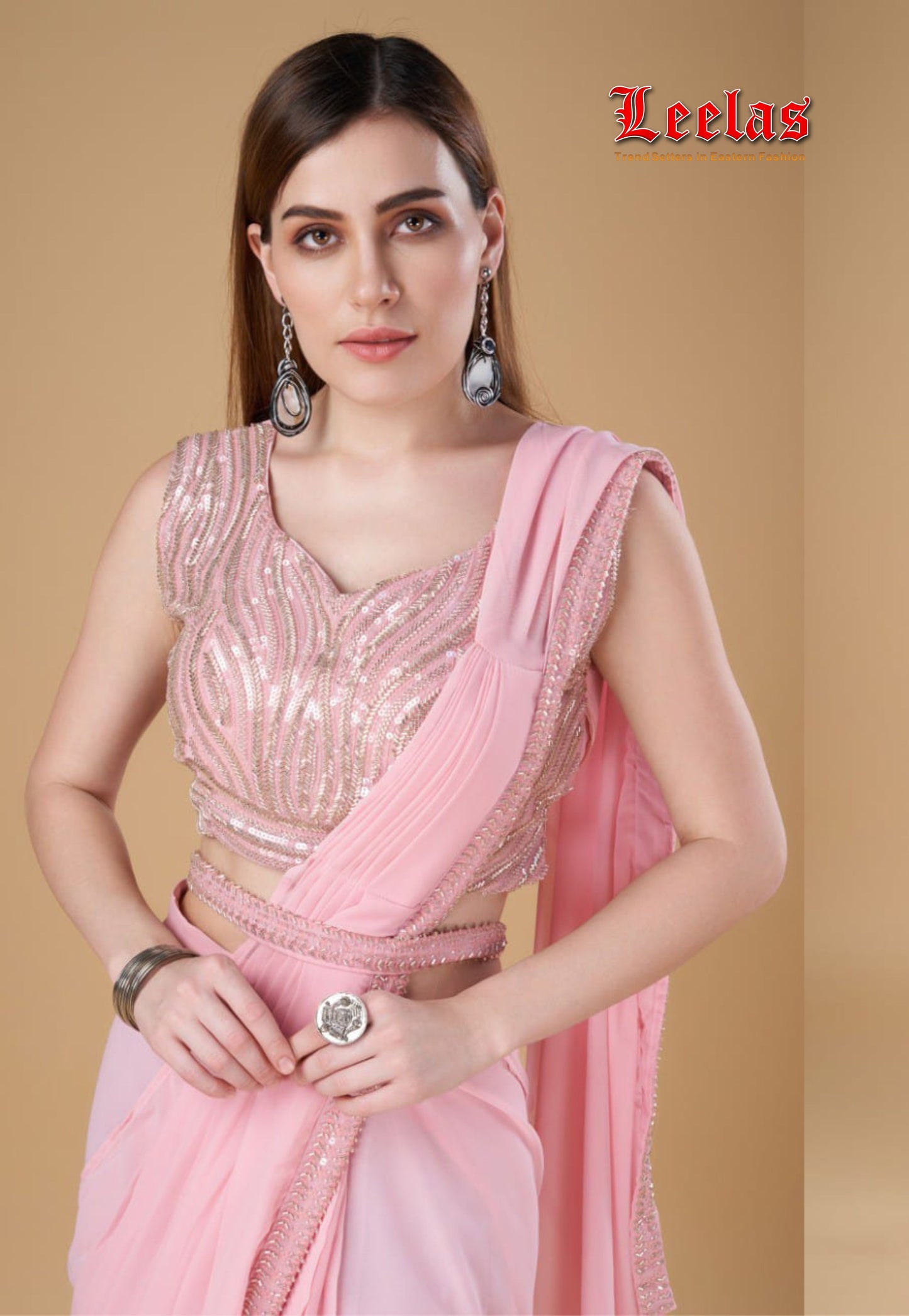Blush pink georgette ready stitched saree.