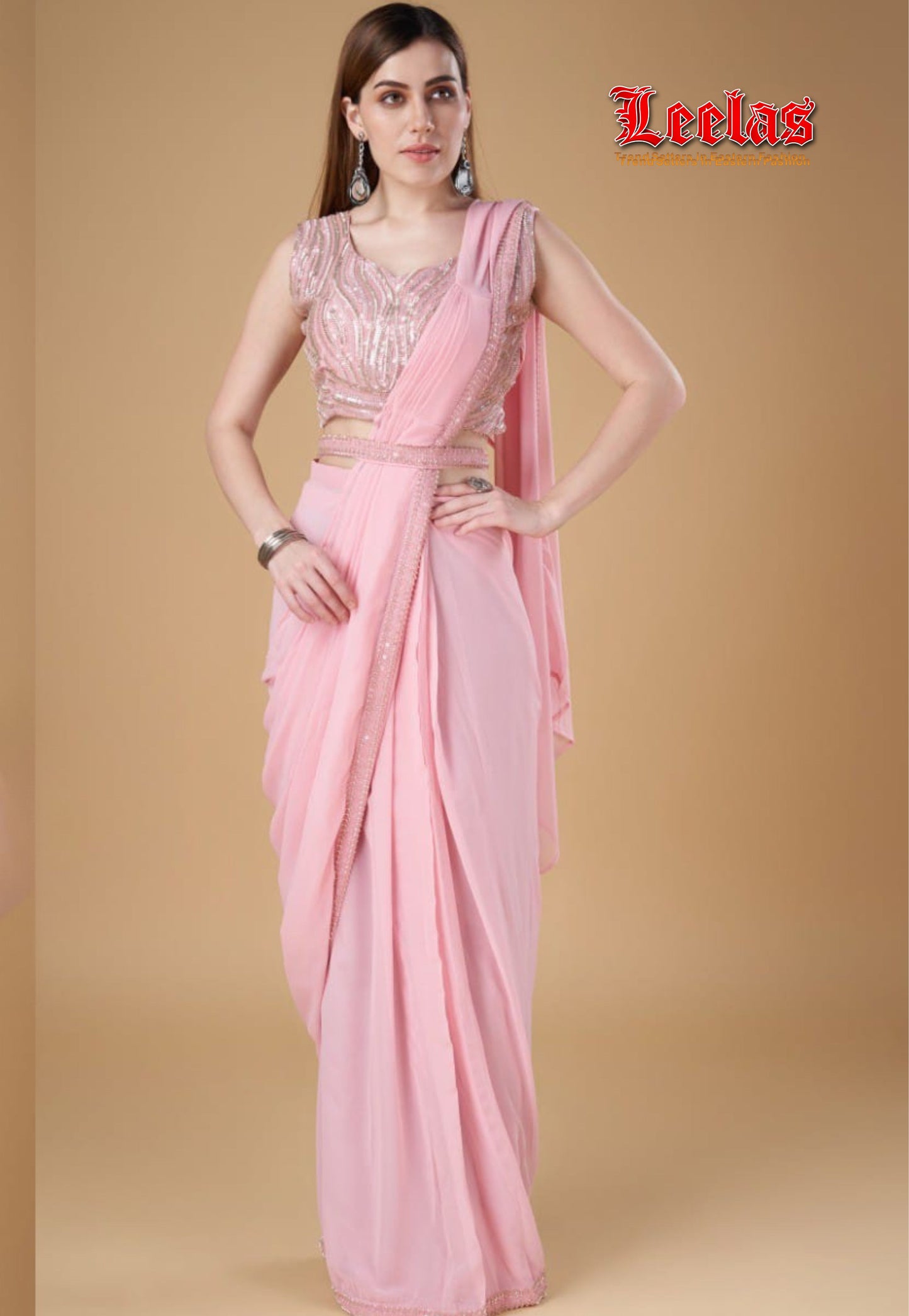 Blush pink georgette ready stitched saree.