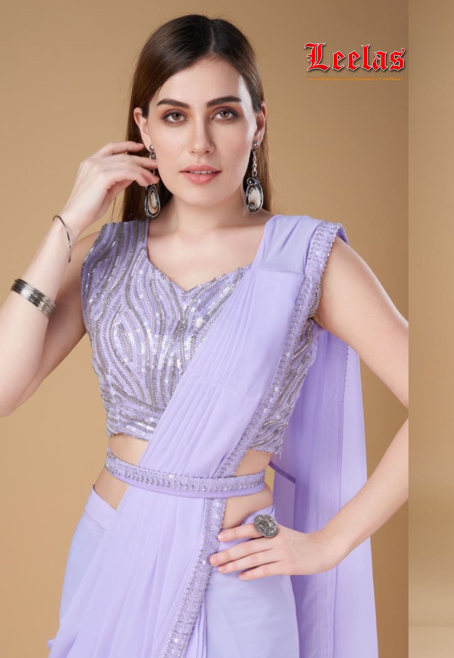 Lilac georgette ready stitched saree with full  silver beaded sleeveless ready made blouse, with unstitched sleeves and matching saree belt