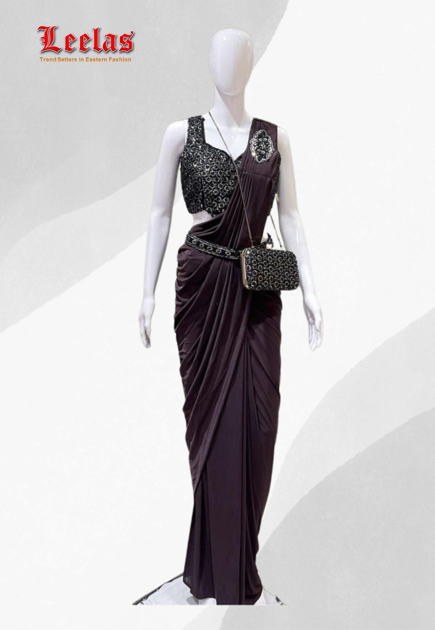Grape silk ready stitched saree with full black beaded and sequin sleeveless ready made blouse, with unstitched sleeves with matching saree belt and hand bag