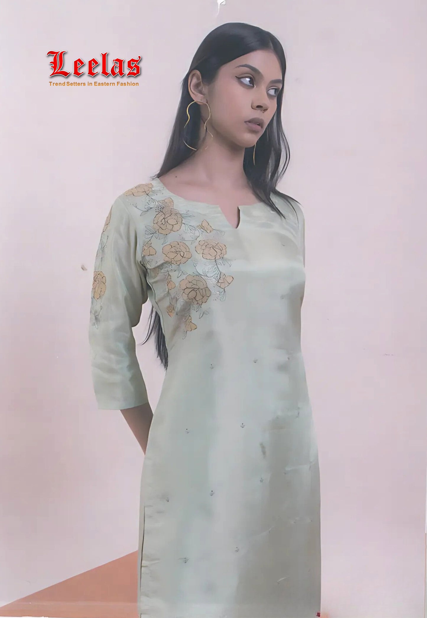 Mint green and gold silk salwar kameez