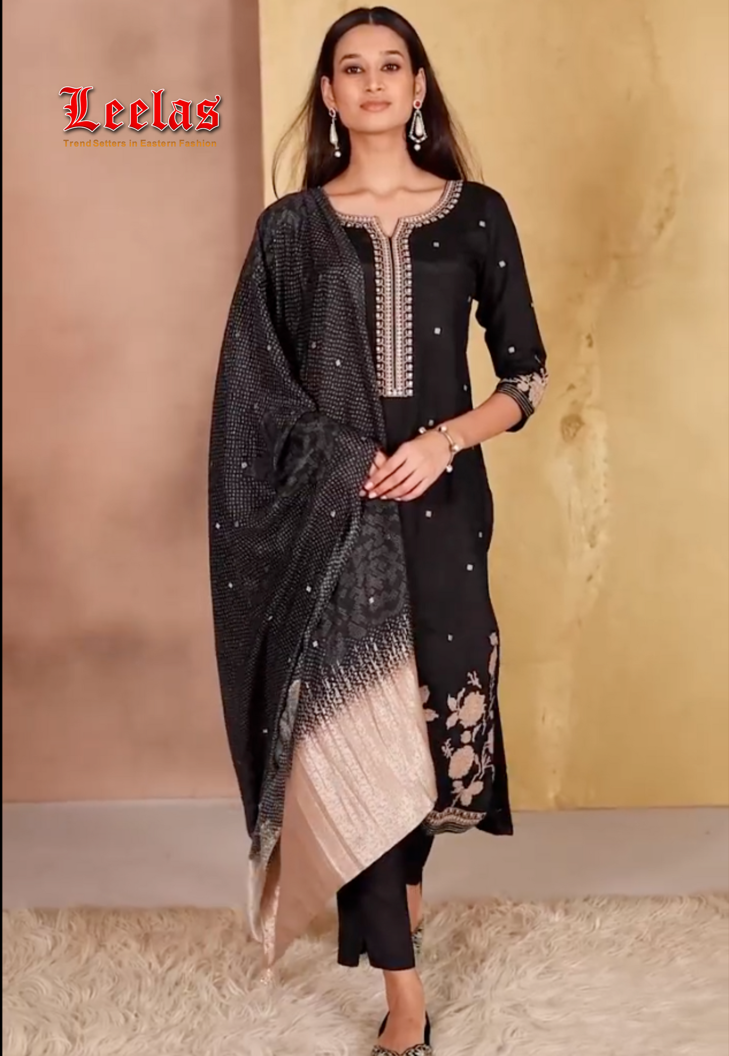 Black and gold silk salwar kameez
