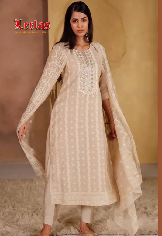 Cream and gold patterned silk salwar kameez