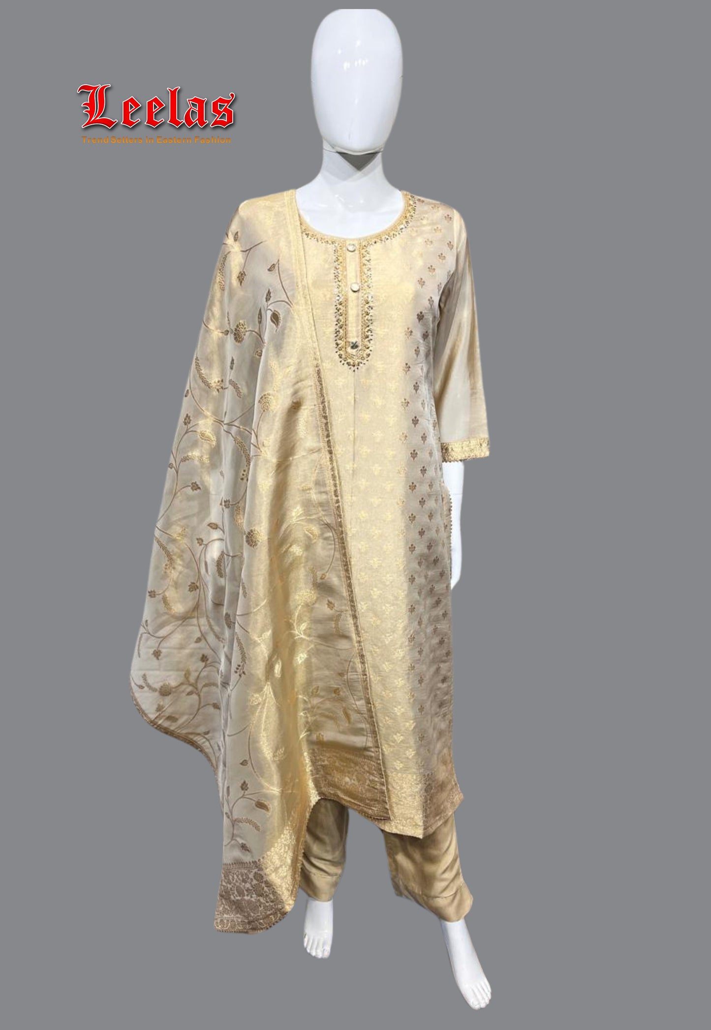 Cream and gold salwar kameez