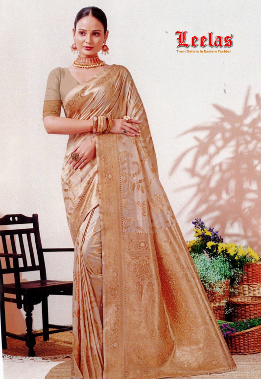 Cream and gold embossed silk saree with blouse piece