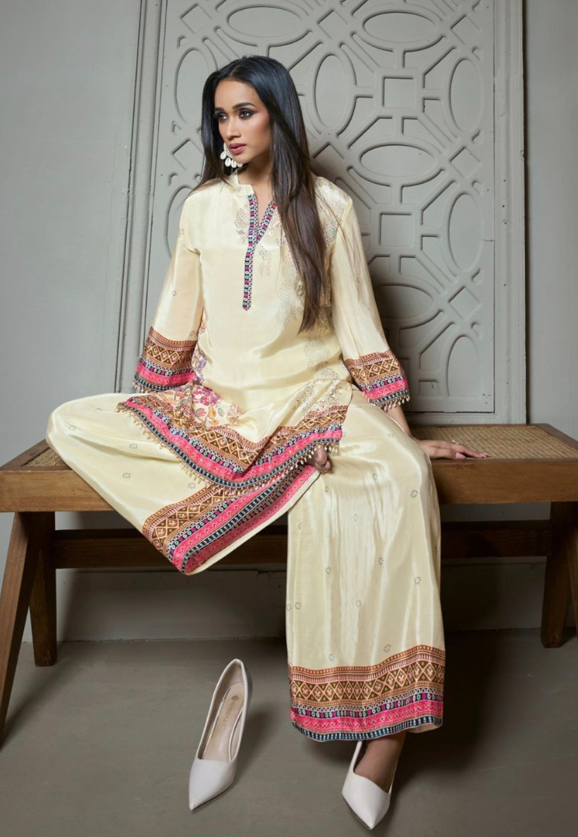 Cream crepe silk kurti set with mirror and stonework