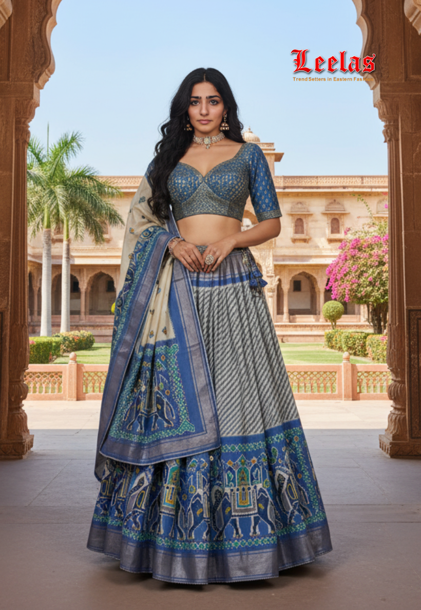 Fully stitched sky blue silk lengha choli with traditional patola design with embroidery and sequins work
