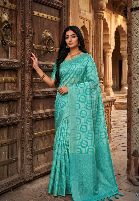Teal geometric block patterned cotton saree with darker shade of turquoise with zari border