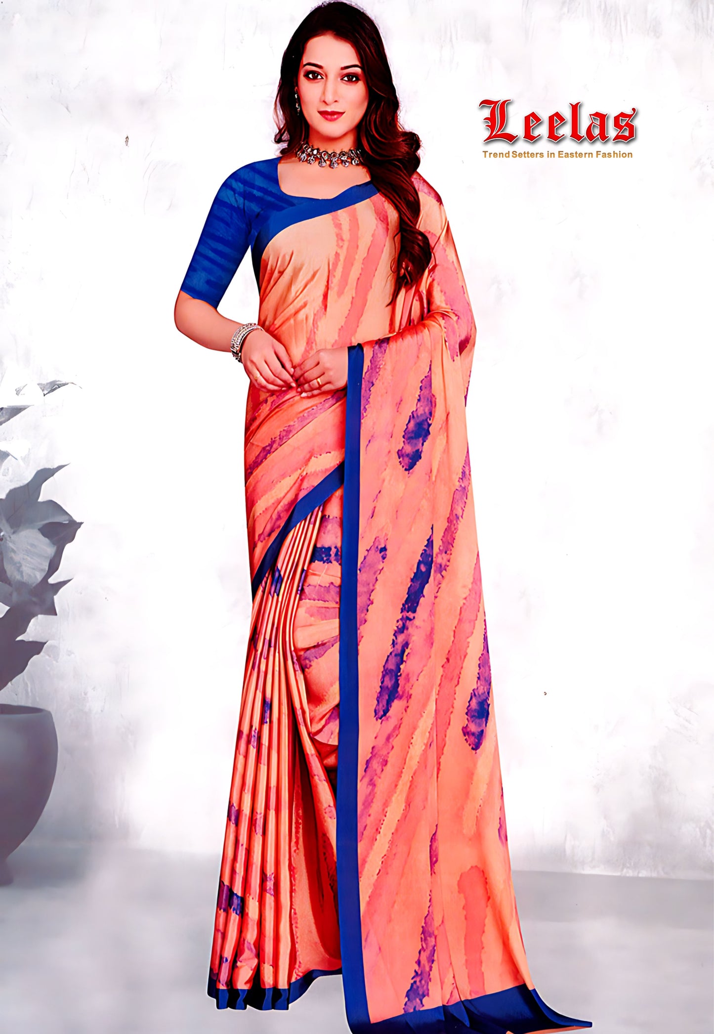 Rose pink and navy abstract print crepe silk saree