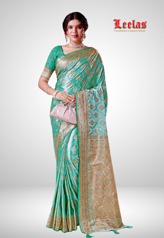 Sea green silk embossed saree with matching blouse piece