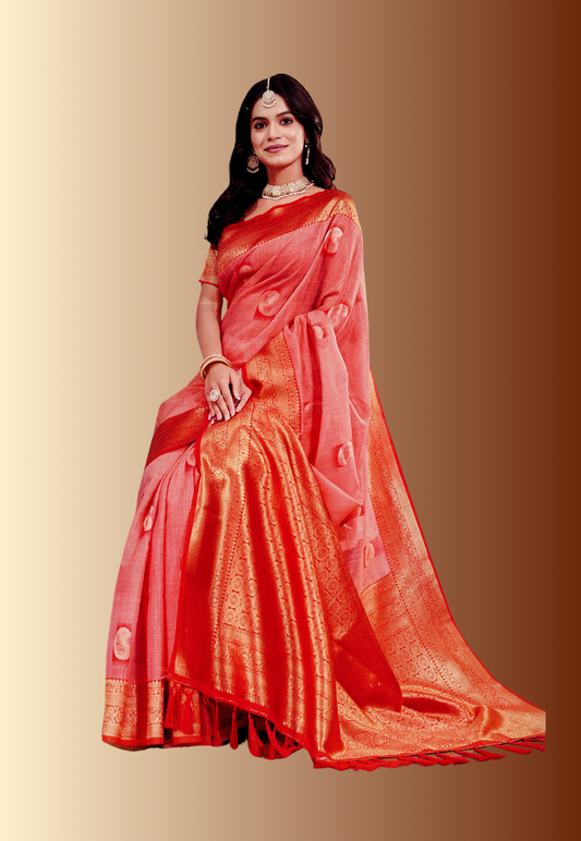 Scarlet red cotton saree with paisley print motifs and contrasting red blouse piece with gold zari embroidery border
