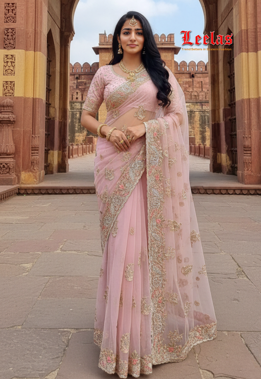 Peach net saree with embroidery and stonework