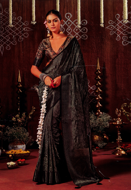 Charcoal grey silk blend saree with light embroidery and paisley border