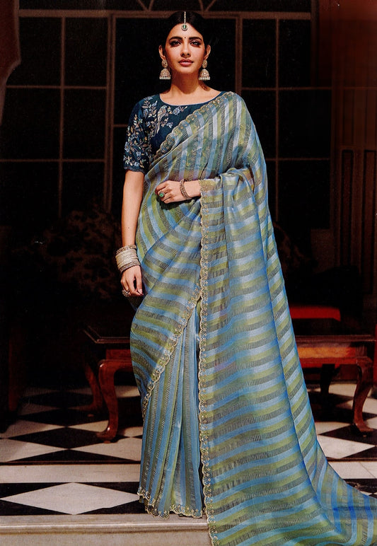 Grey/blue tissue silk saree, stonework border with contrasting blouse piece