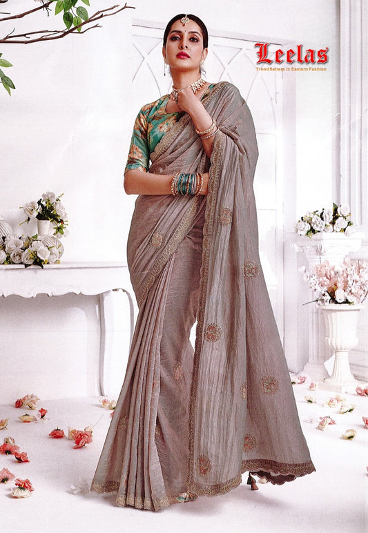 Champagne art silk saree, embroidered border with contrasting blouse piece