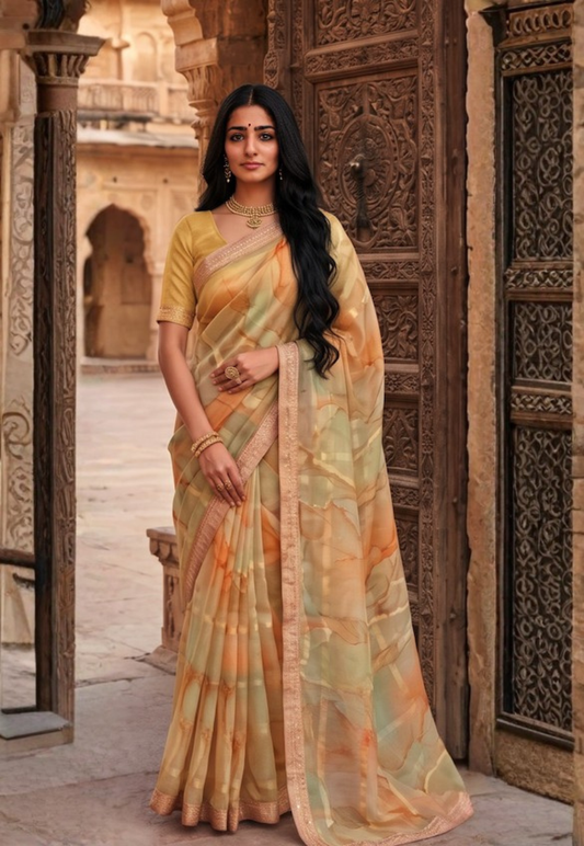 Marble pattern tissue silk saree with warm shades of earthy blends of cream,olive,beige and muted gold with small zari border