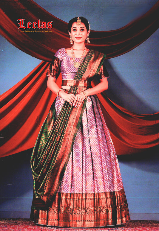 Silk lilac, and bottle green lengha with bronze embossed border