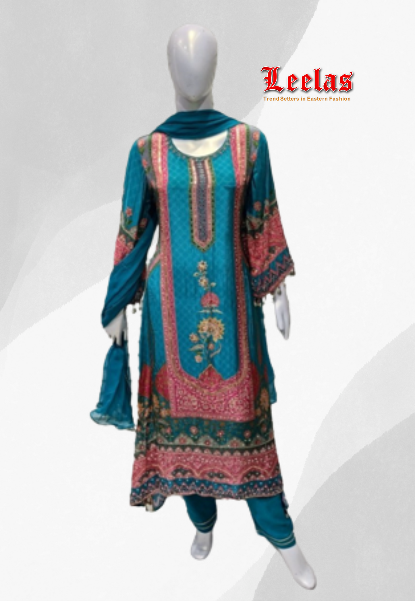 Turquoise and cerise pink silk salwar kameez with mirror and sequins
