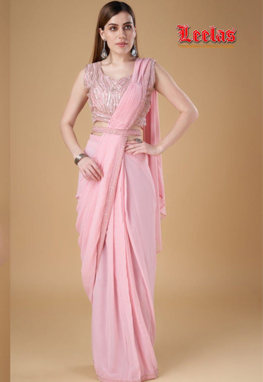 Blush pink georgette ready stitched saree with full  silver beaded sleeveless ready made blouse, with unstitched sleeves and matching saree belt