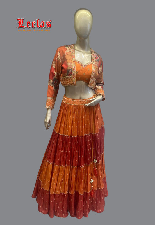 Rust and maroon silk lengha with gold work