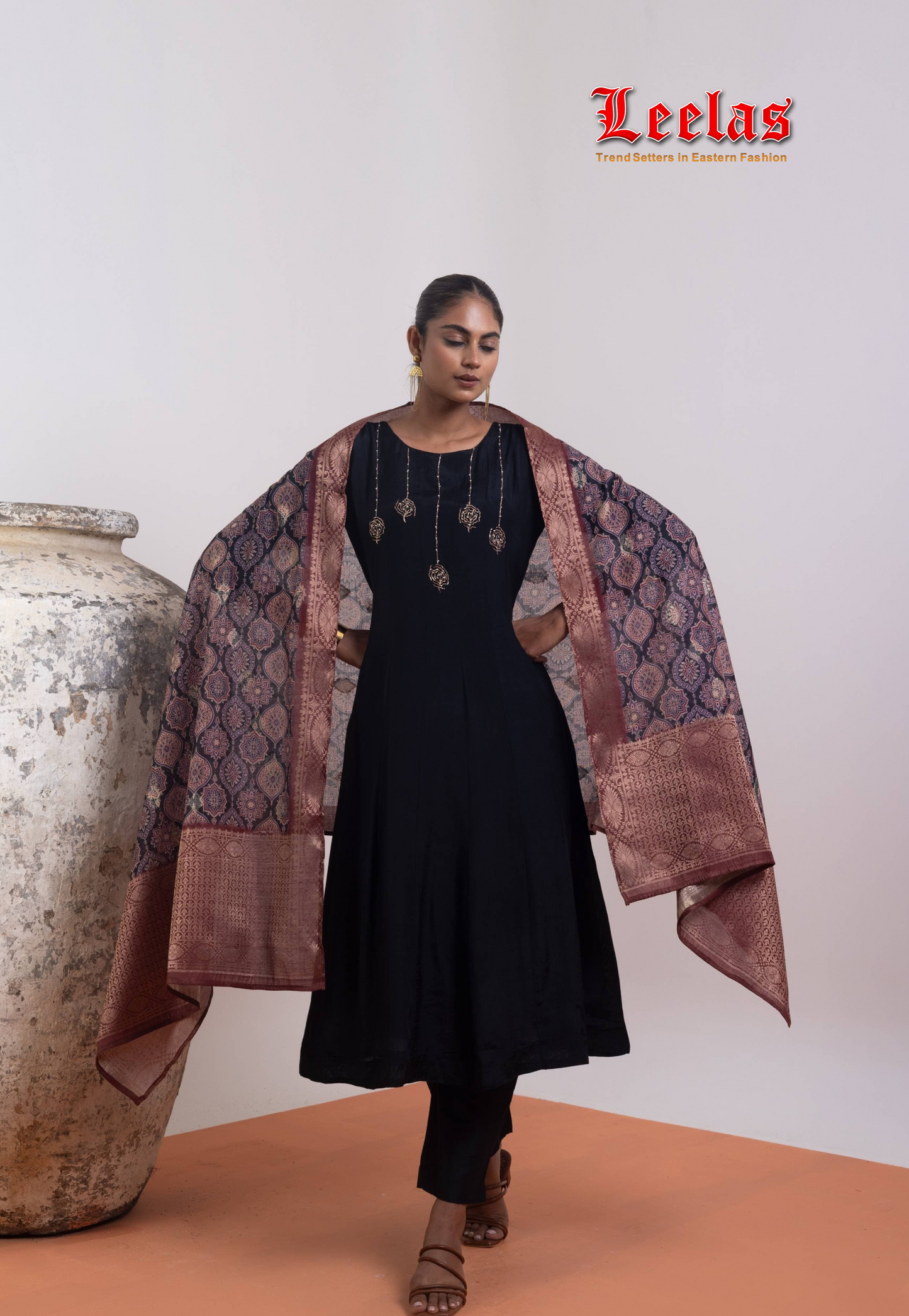 Black and rose gold rayon salwar kameez