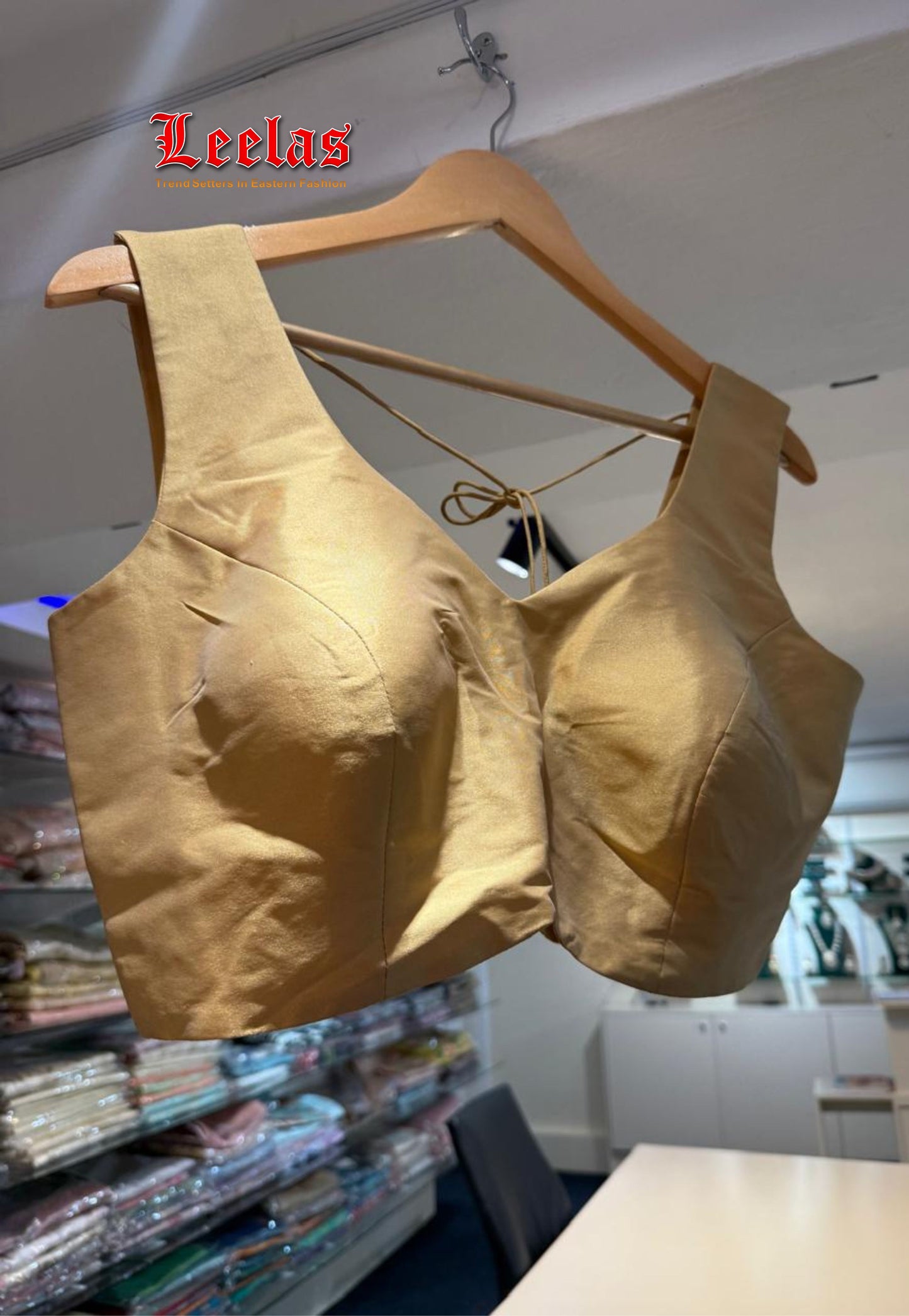 Gold satin ready made sleeveless blouse