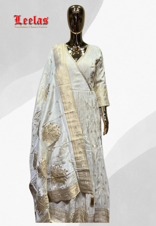 Cream and gold embossed silk long sleeve dress with matching brocade cream