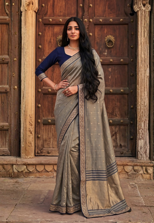 Gold  cotton silk saree with zari border and contrasting navy blouse  piece