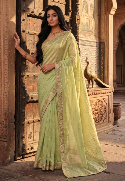 Mint green cotton silk saree  with contrasting dark green blouse  piece