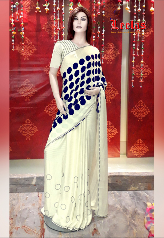 Cream brasso silk saree with black polka dot print and black stonework