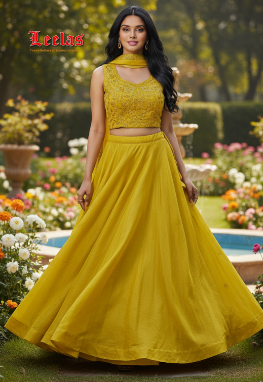 Yellow silk lehengha with ready made blouse with embroidery stone and sequin work